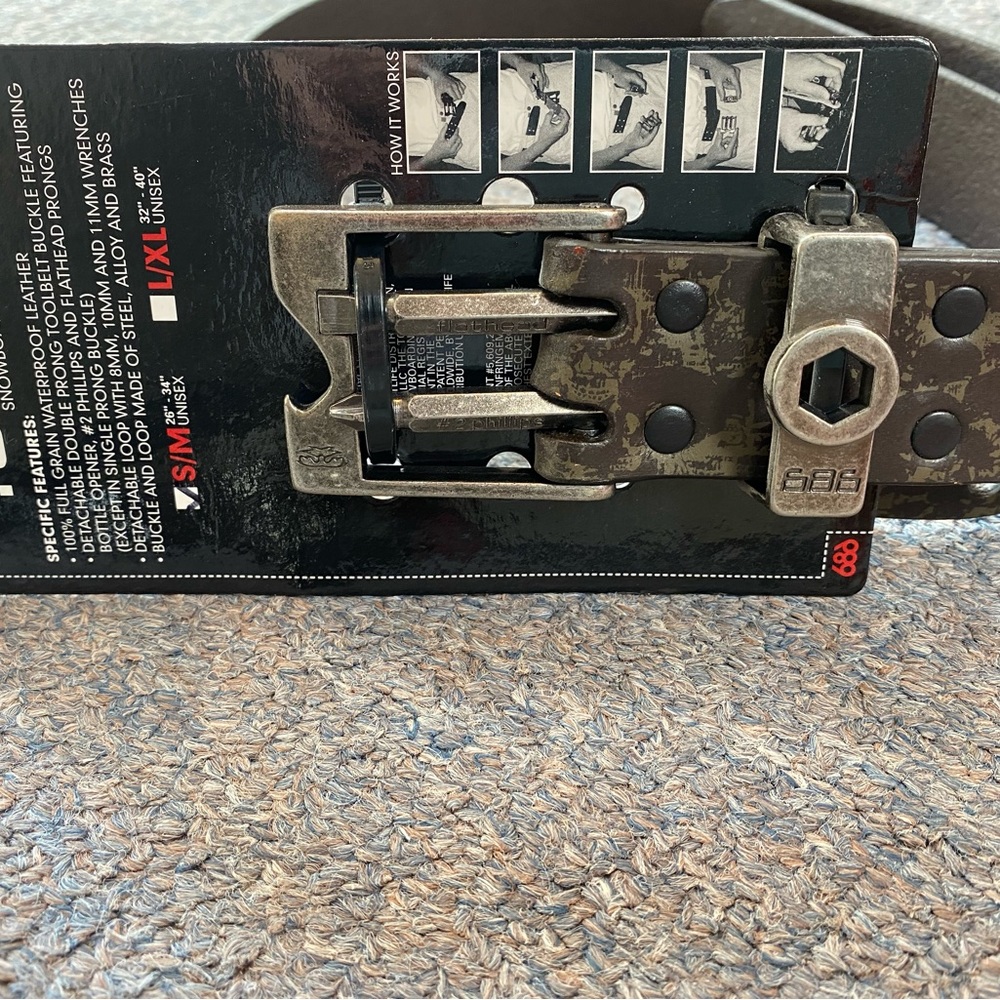 Belt 686 size: S/M 26”-38” New. Color camouflage brown/green